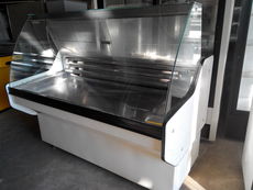 Продам б/у холодильную витрину длиной 1,5 м.