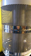 Труба з сіткою для каменів в сауну